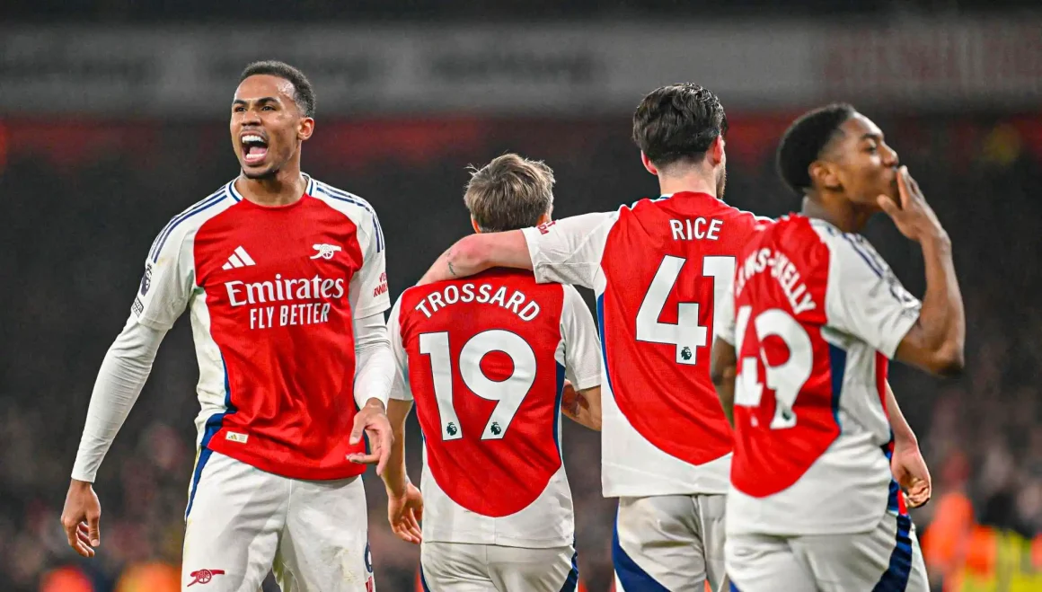 Arsenal climb to the summit as Liverpool are stung late at Stamford Bridge