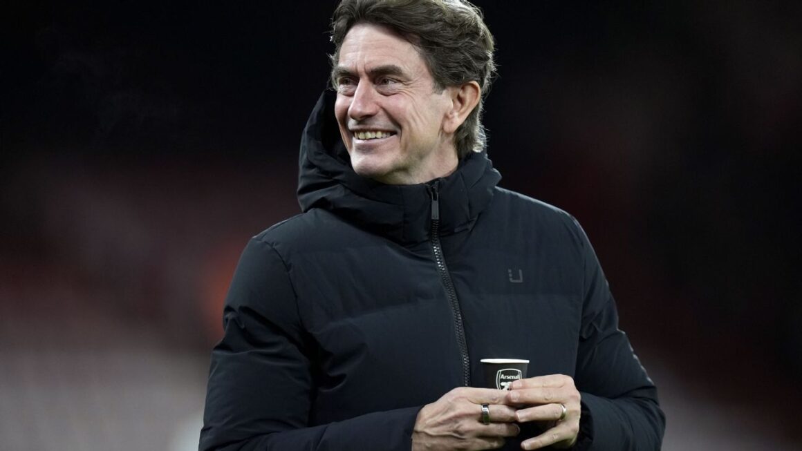 Spurs Manager Sips from…