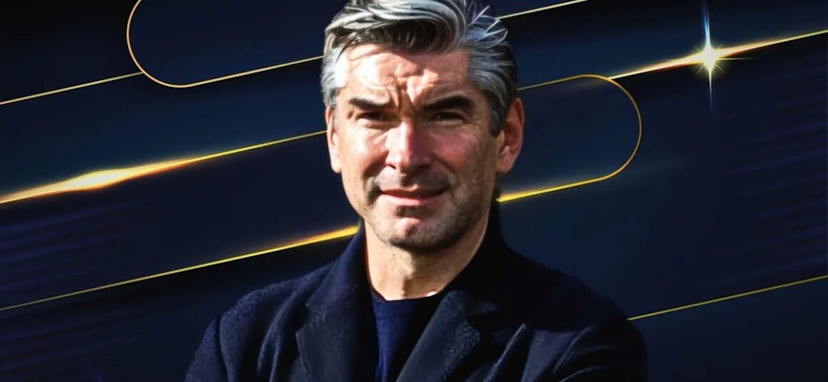Richard Hughes Holds a…