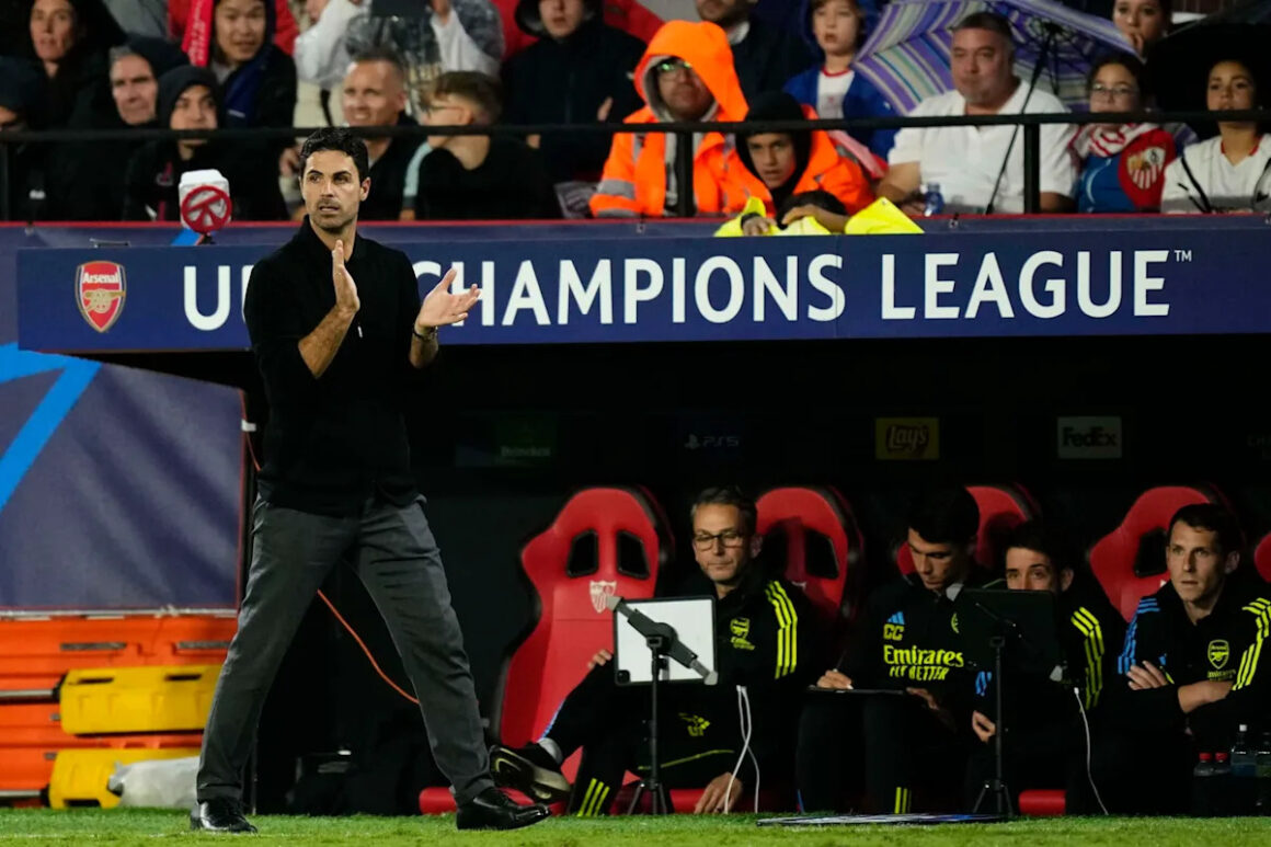 Two Arsenal Players Facing…